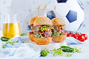 Fresh delicious burgers in Form of Football soccer