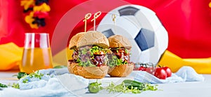 Fresh delicious burgers in Form of Football soccer