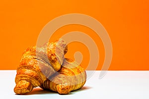Fresh and delicious croissants isolated. French breakfast concept
