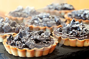 Fresh, delicious homemade chocolate tart with hazelnuts