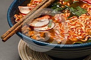 Ramen soup with egg, spring onion and vegetables
