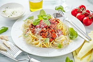 Fresh and delicious spagetti bolognese on wooden table.