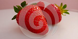 Fresh Delicious Strawberries lying on the Table