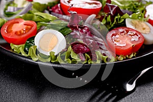 Fresh delicious vegitarian salad of chopped vegetables on a plate