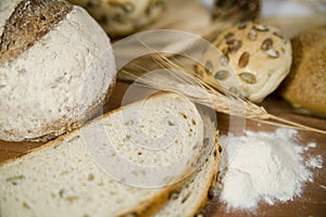 Fresh different kinds of bread with sour and wheat head