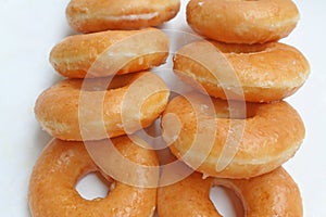 Fresh donuts in white paper box