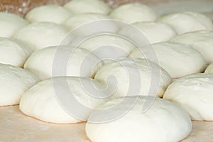 Fresh dough on the wooden board, pizza, Georgian bread