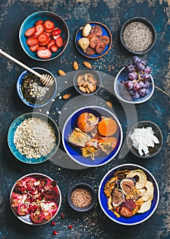 Fresh and dried fruit, chia seeds, oatmeal, nuts, honey