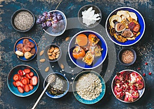 Fresh and dried fruit, chia seeds, oatmeal, nuts, honey