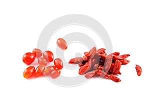 Fresh and dried goji berries isolated on a white background