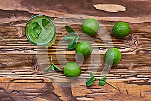 Fresh drink photo of home made limonade on wooden background