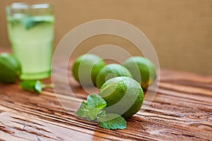 Fresh drink photo of home made limonade on wooden background