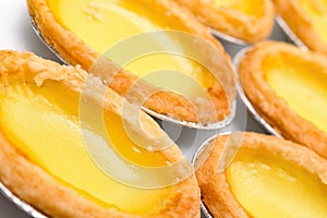 Fresh egg tarts on white background