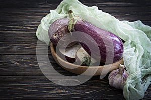 Fresh eggplant on old background cooking summer dinner organic