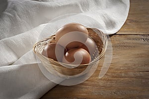 Fresh eggs in a basket