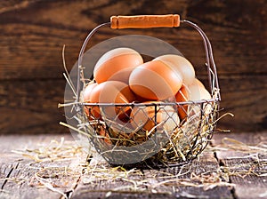 Fresh eggs in a basket