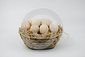 Fresh Eggs in and out of bamboo basket