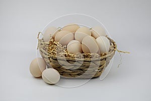 Fresh Eggs in and out of bamboo basket