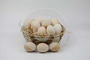 Fresh Eggs in and out of bamboo basket