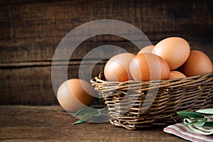 Fresh eggs in a willow basket