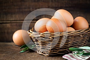 Fresh eggs in a willow basket