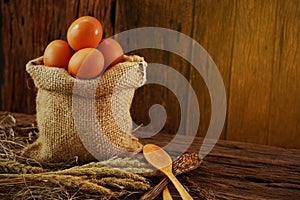 Fresh eggs on wooden background from farm and prepare for cook in kitchen room, Organic food and clean food for healthy,