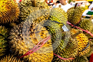 Fresh exotic tropical fruit durian on sale on a local market, Bali island.