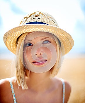 Fresh-faced and naturally lovely. Closeup of a casual young woman outdoors - portrait.