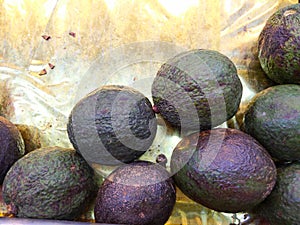 Fresh Farm Avacado placed in a golden tray for sale