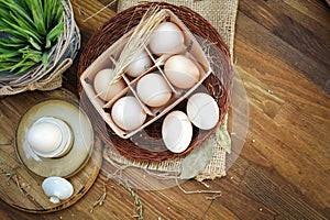 Fresh farm eggs on a wooden background