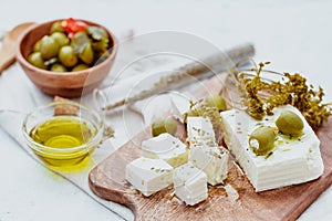 Fresh feta cheese with herbs photo