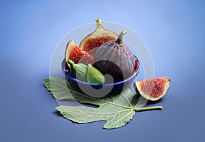 Fresh fig fruit and fig leaf.