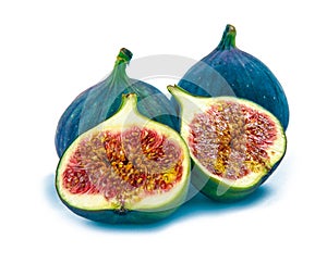 Fresh fig fruit and half with leaves isolated