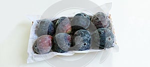 Fresh figs in cardboard box overview