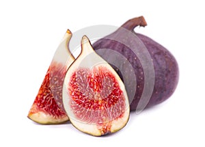 Fresh figs fruit isolated on white background. Ripe sliced fig fruits.