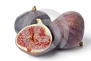 Fresh figs on plain background