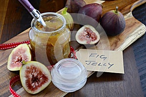 Fresh Figs and Preserve on Wood Table