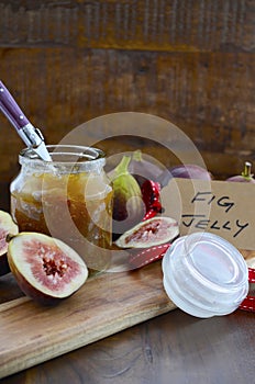 Fresh Figs and Preserve on Wood Table