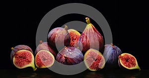 Fresh figs with water drops isolated. Healthy Food Concept with Copy Space.