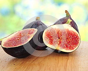 Fresh figs on wooden board