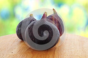 Fresh figs on wooden board