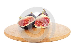 Fresh figs on wooden board