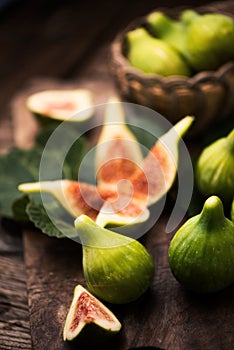 Fresh figs on wooden table