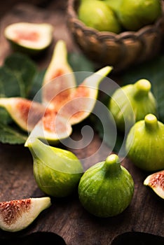 Fresh figs on wooden table