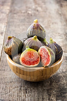 Fresh figs on wooden table