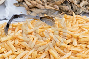 Fresh fish & chips seafood anchovies sardines mix during hotel brunch buffet