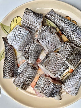 Fresh fish cut into small pieces for cooking