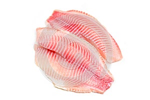 Fresh fish fillet sliced for steak or salad - Raw tilapia fillet fish isolated on white background for cooking food