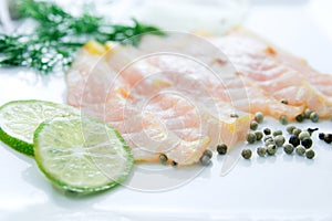 Fresh fish fillet sliced on white background