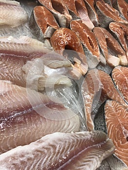 Fresh fish fillets and steaks on the market